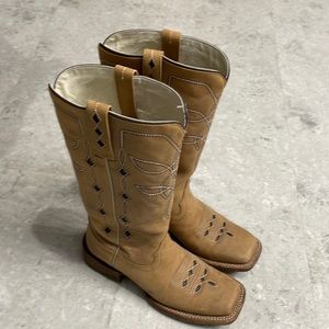 Tall Ariat leather women’s cowboy boots. 6.